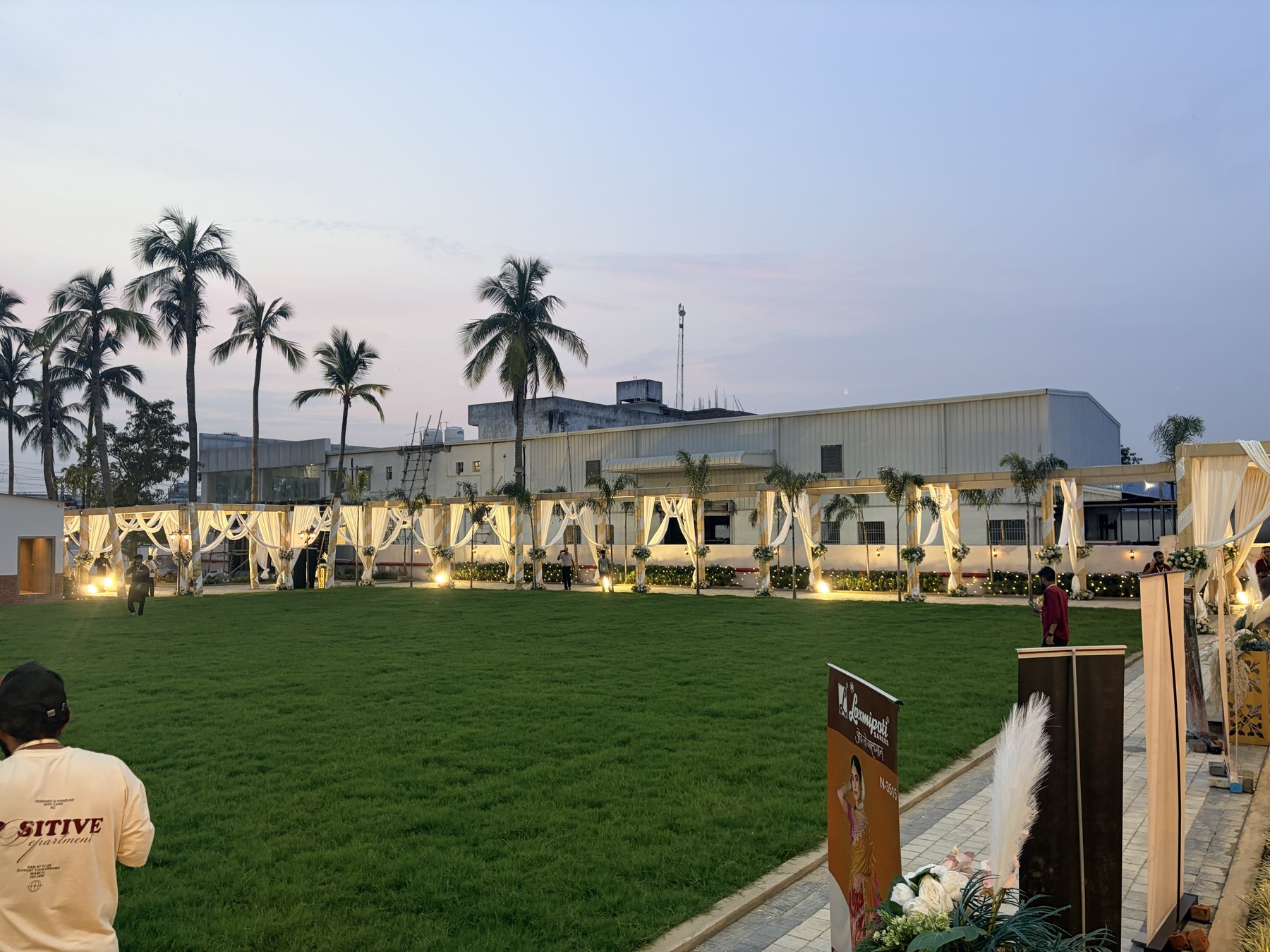 The Chinmaye Grand — the lawns at dusk, dressed for a wedding evening
